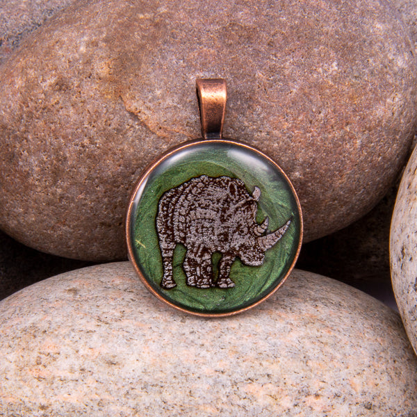 Handcrafted Bespoke Mighty Rhino Pendant; set in Bronze Effect metal bezel.| Jabbawocky Crafts (jabbawockycrafts.co.uk)