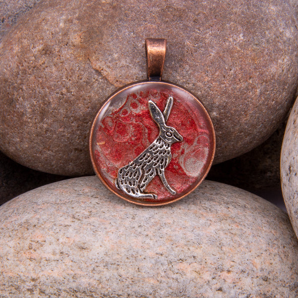 Handcrafted Bespoke Moon Gazing Hare Pendant; set in Copper Effect metal bezel.| Jabbawocky Crafts (jabbawockycrafts.co.uk)