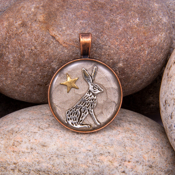 Handcrafted Bespoke Moon Gazing Hare Pendant; set in Copper Effect metal bezel.| Jabbawocky Crafts (jabbawockycrafts.co.uk)