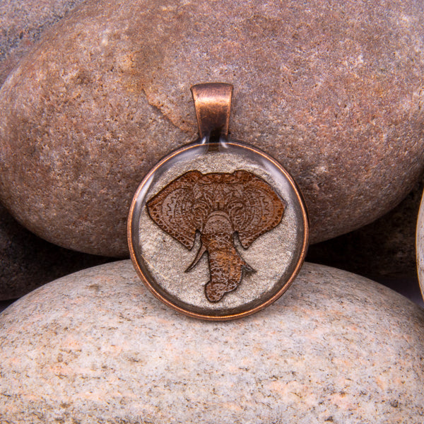Handcrafted Bespoke Majestic Elephant Pendant; set in Copper Effect metal bezel.| Jabbawocky Crafts (jabbawockycrafts.co.uk)